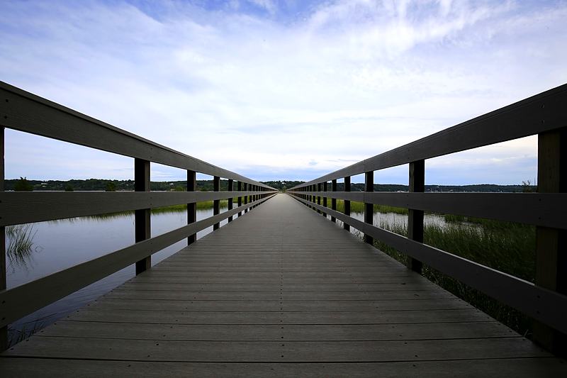 Boardwalk running to the horizon in one-point perspective