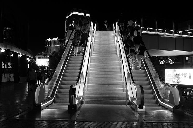 Black and white escalators, strong opposing diagonals