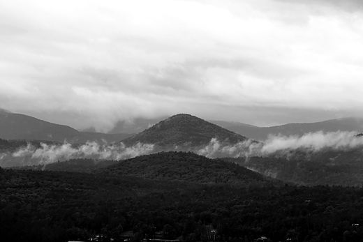 Black and white ridgeline lost in low cloud