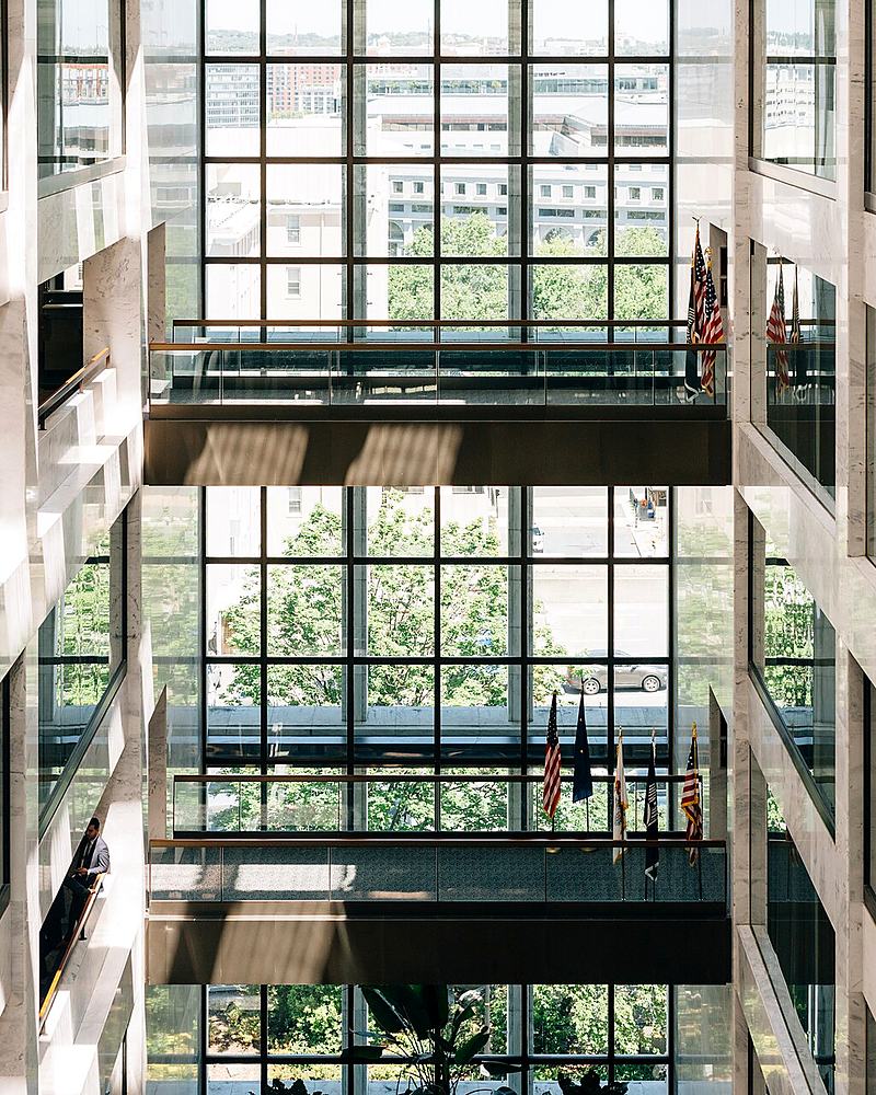 Reference frame: glazed office atrium seen from an upper floor