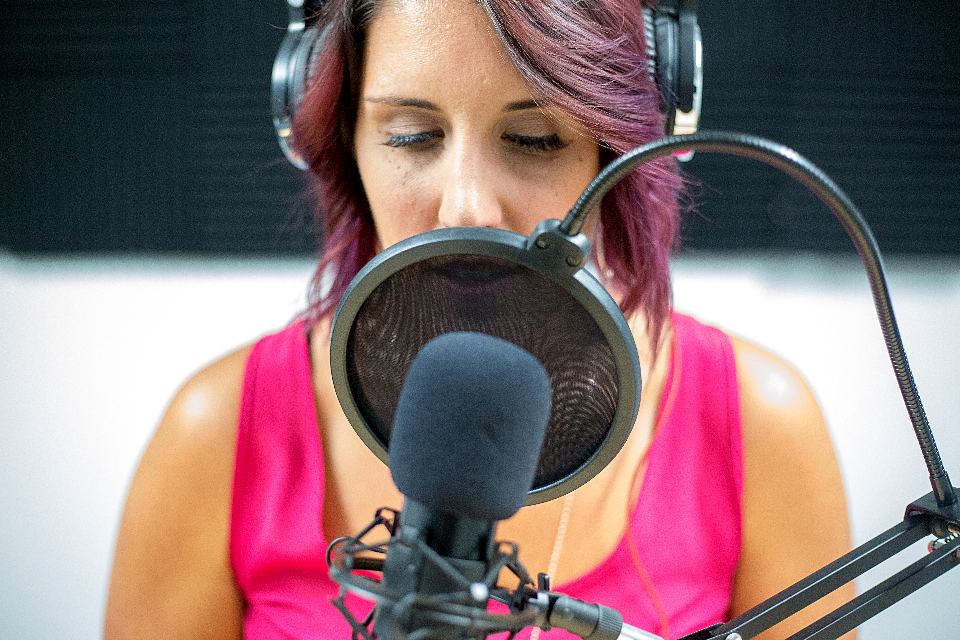 Reference frame: a vocalist tracking behind a pop shield