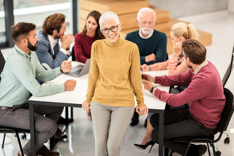 Reference frame: a mixed team in discussion in a workplace
