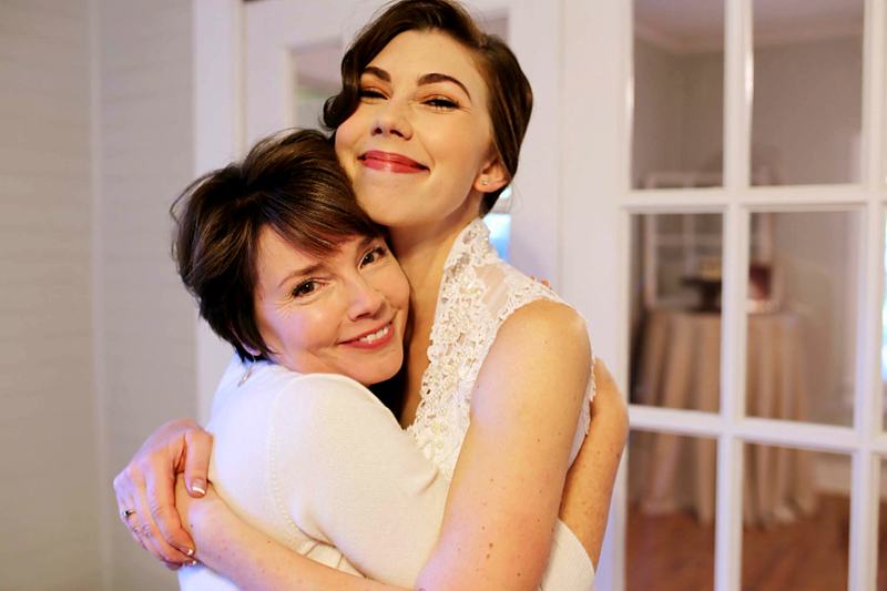 Reference frame: a mother and her adult daughter embracing