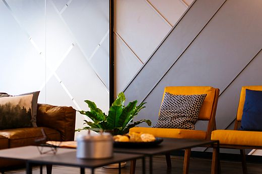 Reference frame: informal office lounge with sofa and low table
