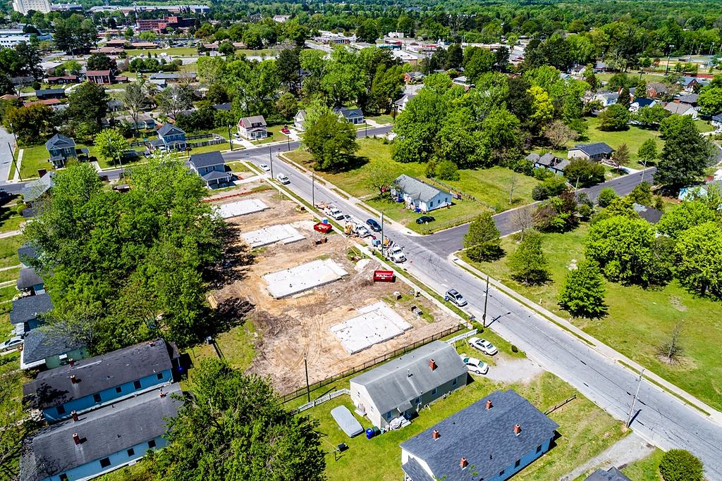 Reference frame: an aerial of tree-lined suburban streets