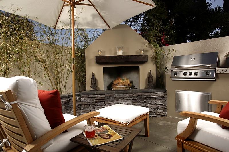 Reference frame: a covered patio with an outdoor fireplace and grill