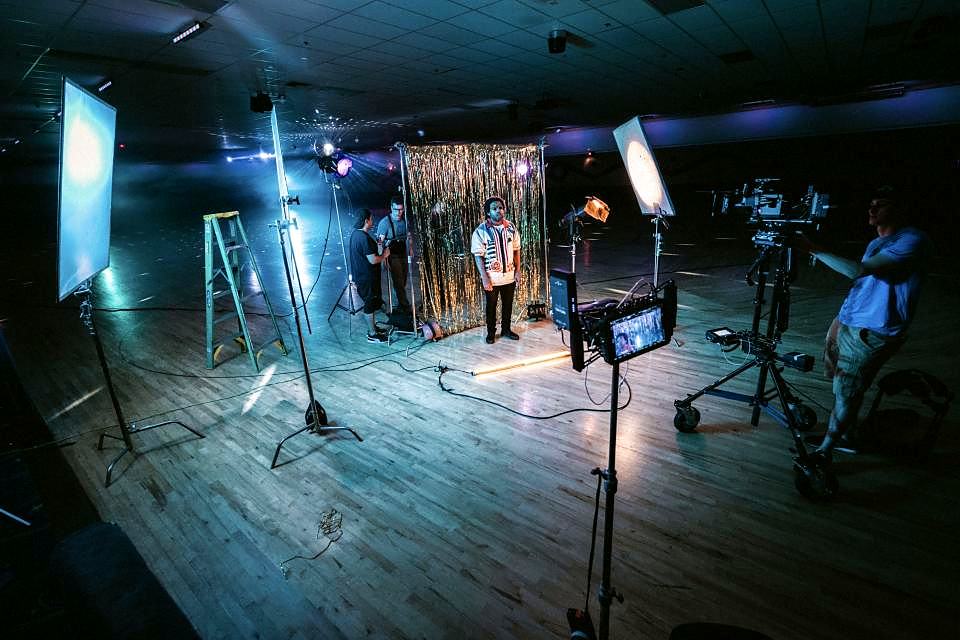 Reference frame: a production set with lighting and monitors