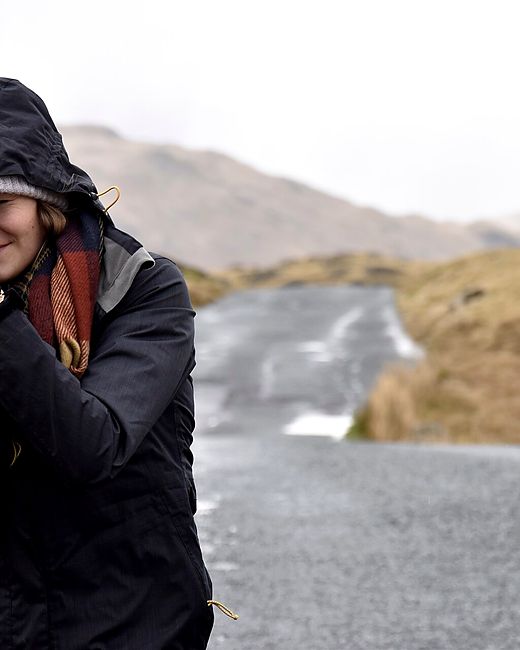 Reference frame: photographer working handheld on an empty road