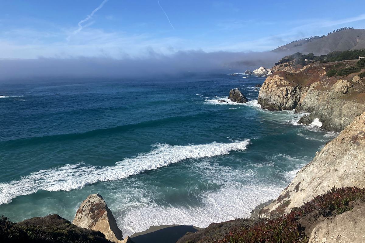 Coastline seen from high above, headlands falling away into the Pacific