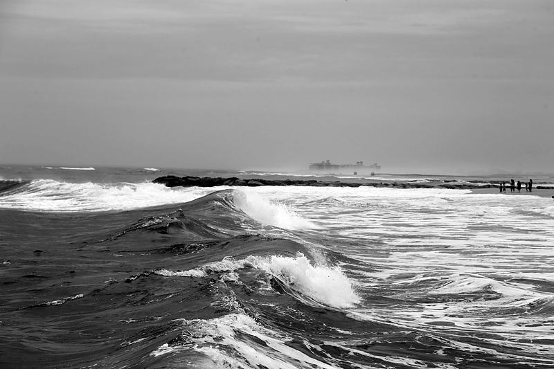 Black and white waves breaking